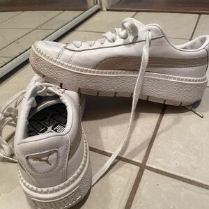 Puma platform sneaker, with gold stripe.